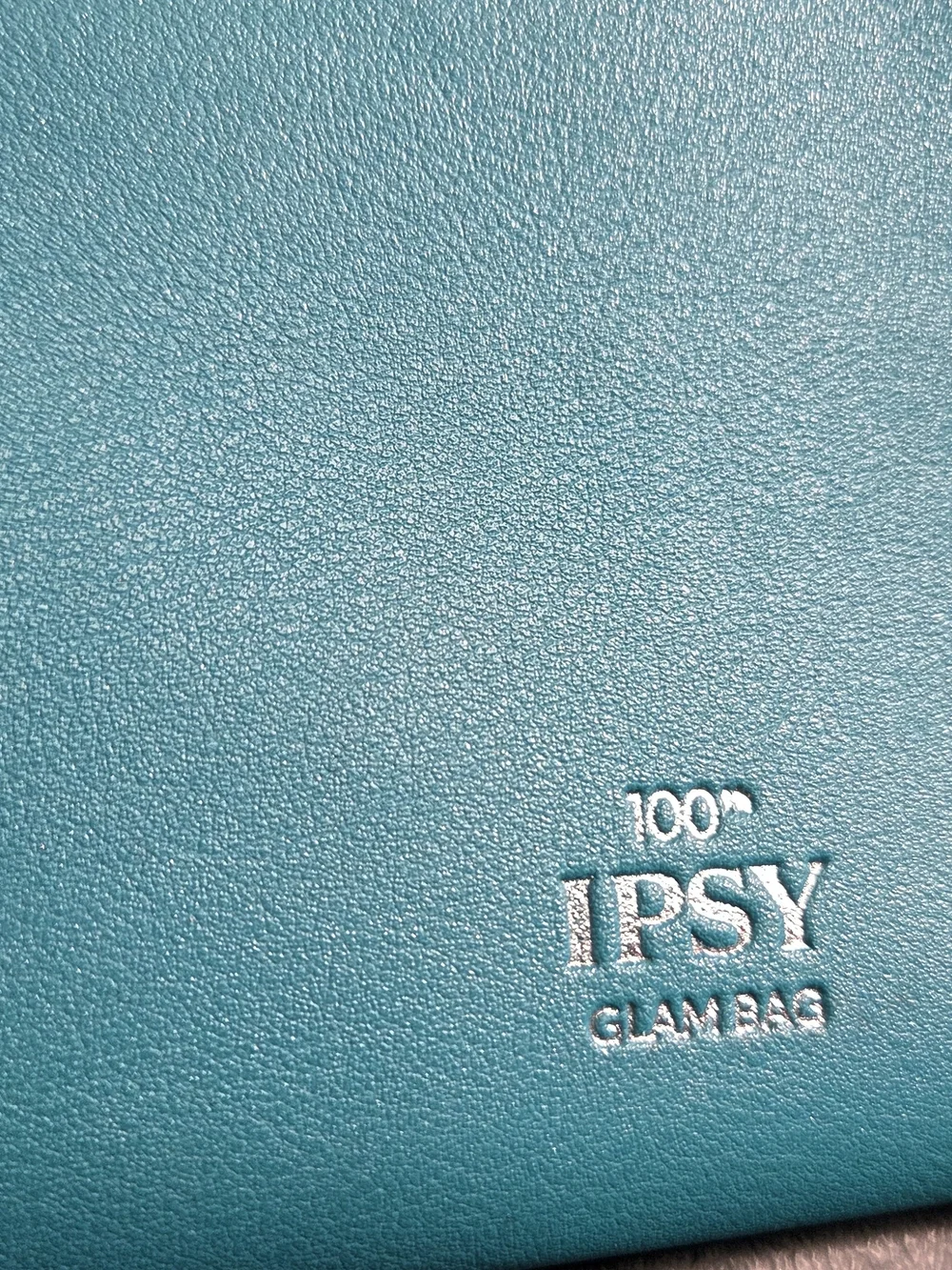 ipsy Turquoise Studded Cosmetic Pouch with Yellow Tassel